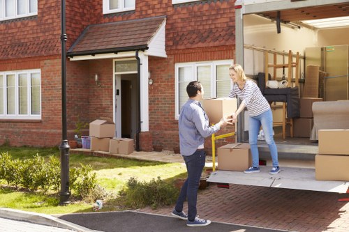 Packed furniture and cartons ready for transport in a moving service