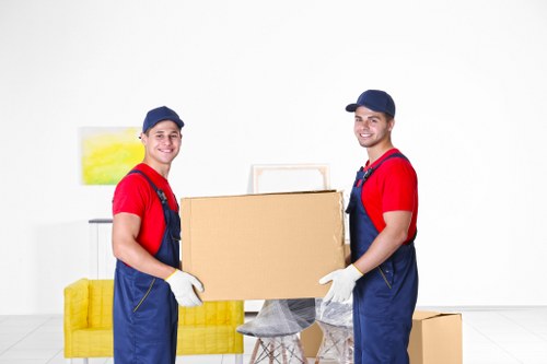 Removal team handling luxury furniture in Mayfair