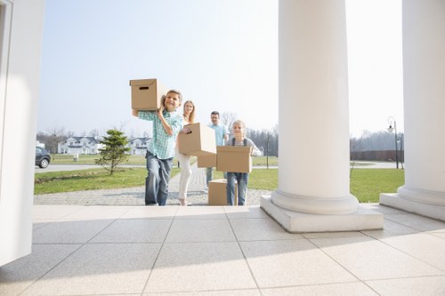 Moving van and boxes illustrating a transparent Mayfair Movers quote