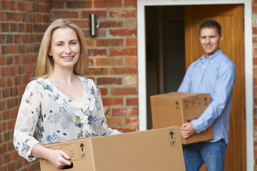 Student removals planning in Mayfair with packed boxes and moving van