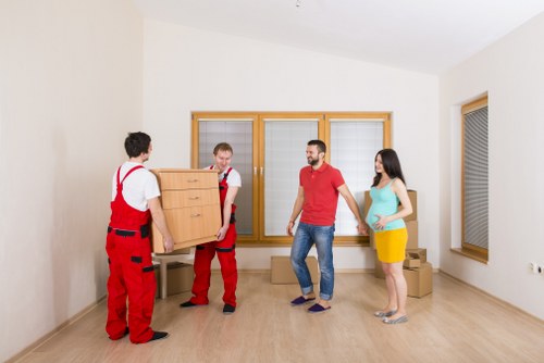 Removal truck loading furniture for a Mayfair apartment move