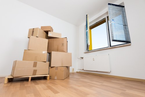 Professional movers navigating a Mayfair residential street