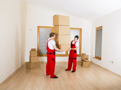 Professional movers handling delicate items in central London