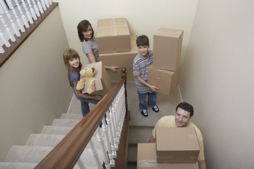 Mayfair moving team loading furniture and boxes into a van for a local relocation